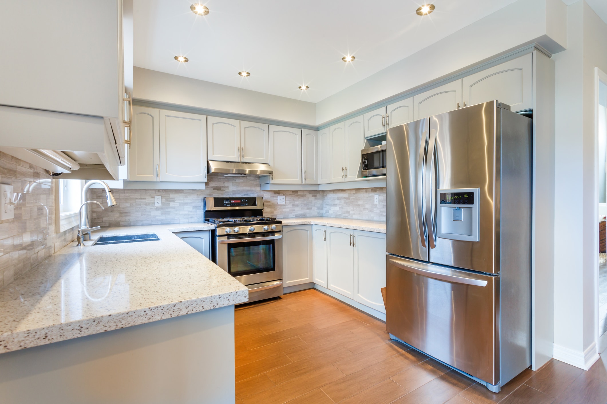 After appliance recycling rebates, this kitchen was outfitted with new, energy efficient appliances.